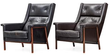 A pair of Karl- Erik Ekselius black leather armchairs, JOC, Vetlanda early 1960's.