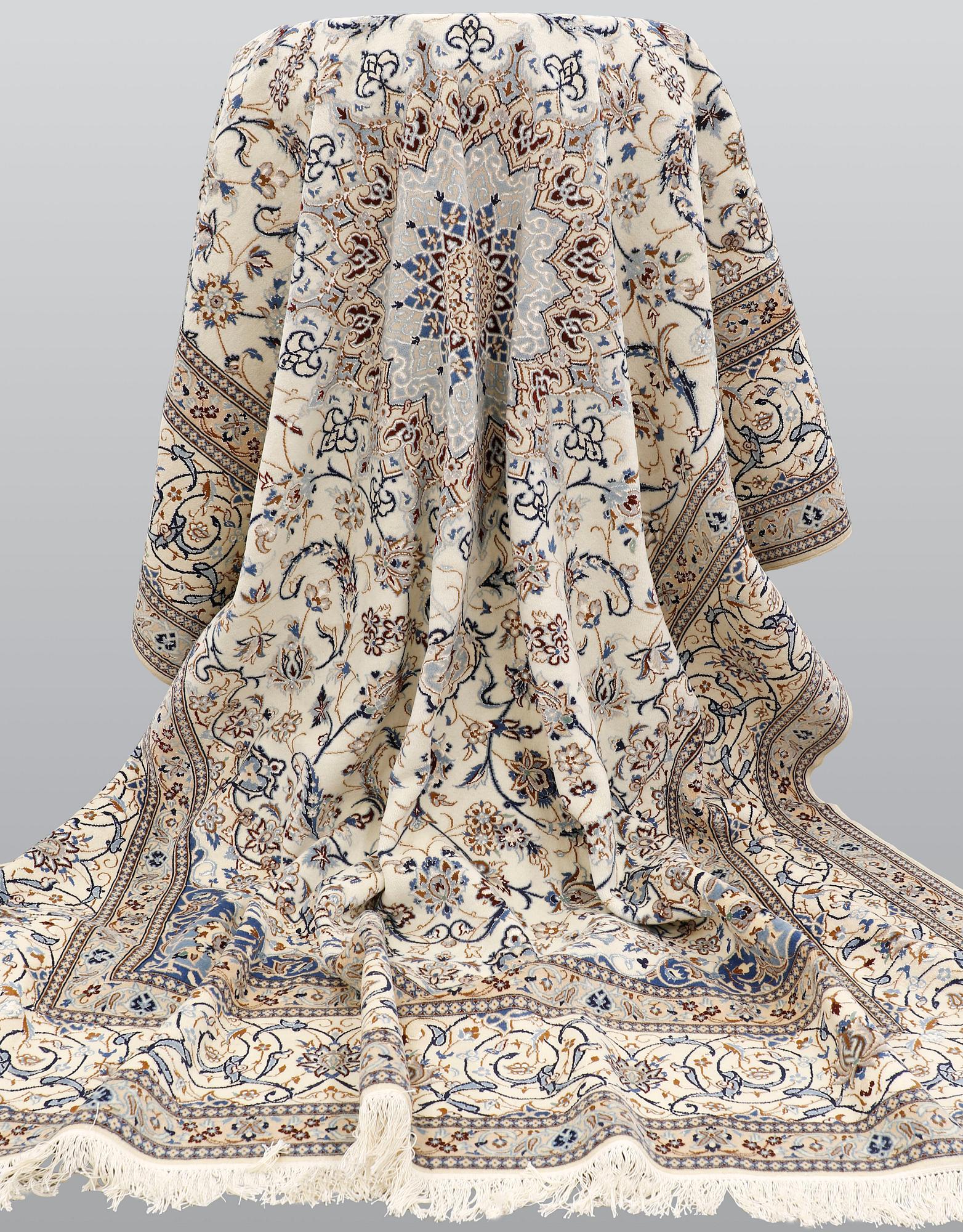 A carpet, Nain part silk s.k 9LAA, ca 355 x 260 cm.