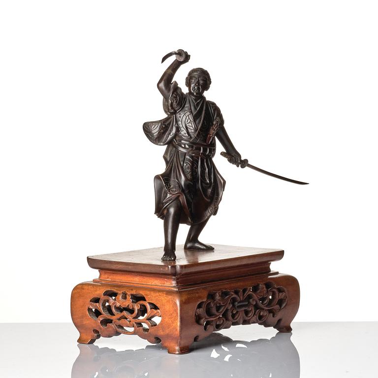 A Japanese bronze sculpture of a samurai warrior, presumably Taisho, or later. Signed.