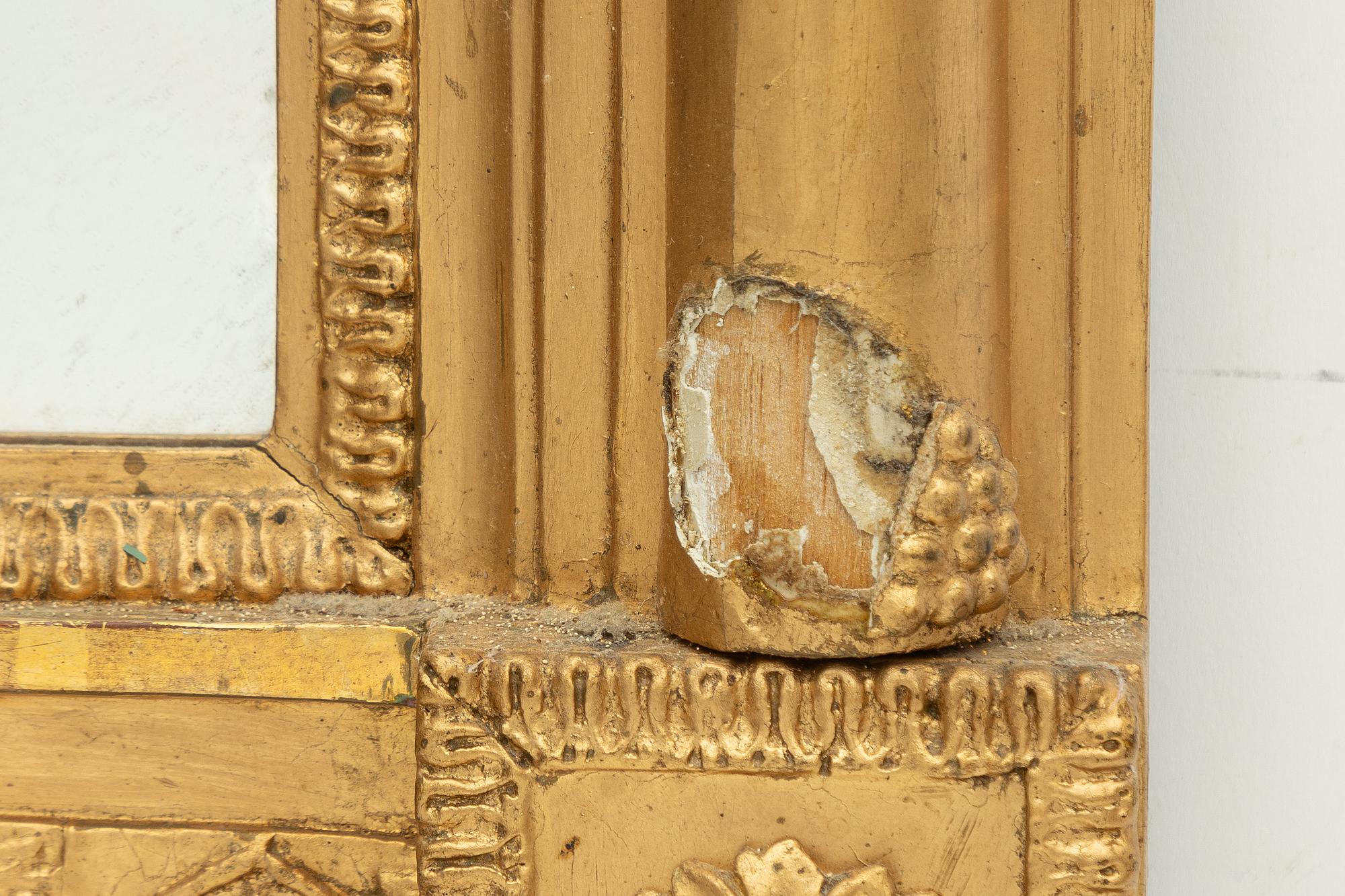 Empire, An Empire mirror, first half of the 19th century.