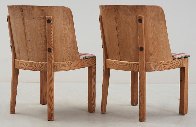 A pair of Axel Einar Hjorth 'Lovö' stained pine armchairs, Nordiska Kompaniet, 1930's.