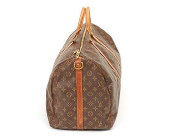 A monogram canvas bag by Louis Vuitton,