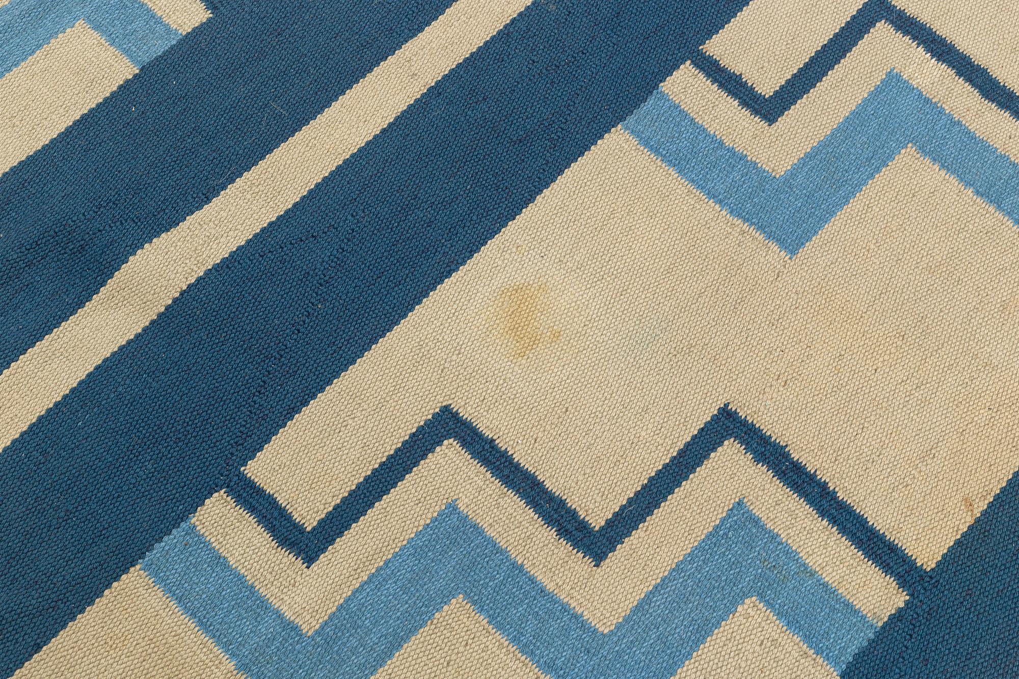 A flat weave carpet, Sweden, dated 1936, c. 370 x 260 cm.