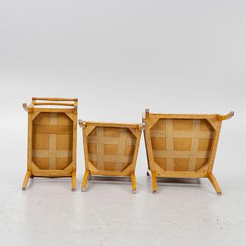 A birch sofa with two armchairs, four chairs and two stools and a mahogany center table.