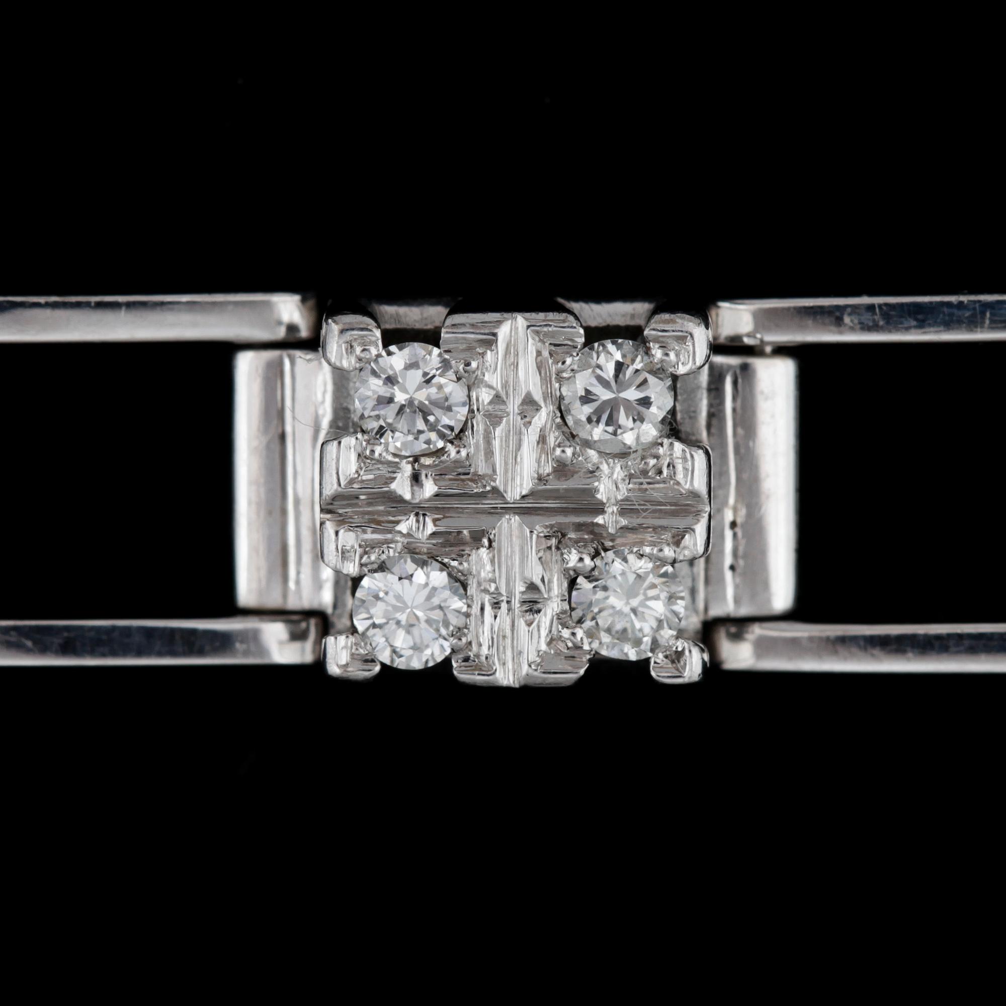 A blue sapphire and brilliant cut diamond bracelet, tot. app 0.70 cts.