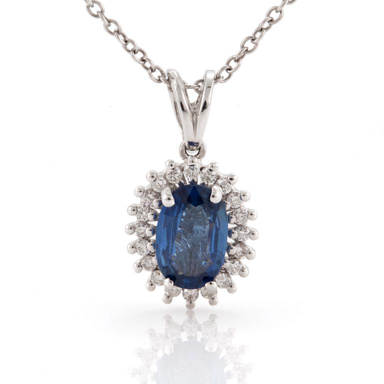 KEDJA samt HÄNGE med fasettslipad safir omgivs av diamanter, 18K vitguld.