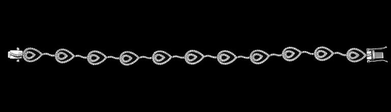 A BRACELET, brilliant cut diamonds c. 1.12 ct. 18K white gold. Length 18,5 cm. Weight 13 g.