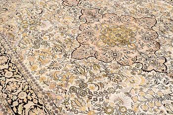 A CARPET, old silk Kashmir, ca 380 x 274 cm.