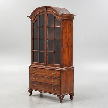 Display cabinet, circa 1900.