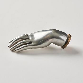 Estrid Ericson, skulptur/ brevpress,  en hand, tenn och mässing, Firma Svenskt Tenn, Stockholm 1900-talets mitt.