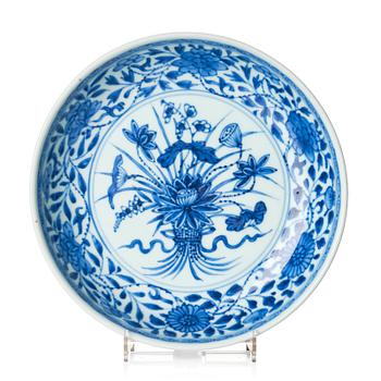 A blue and white 'lotus bouquet' dish, Qing dynasty, 18th century.