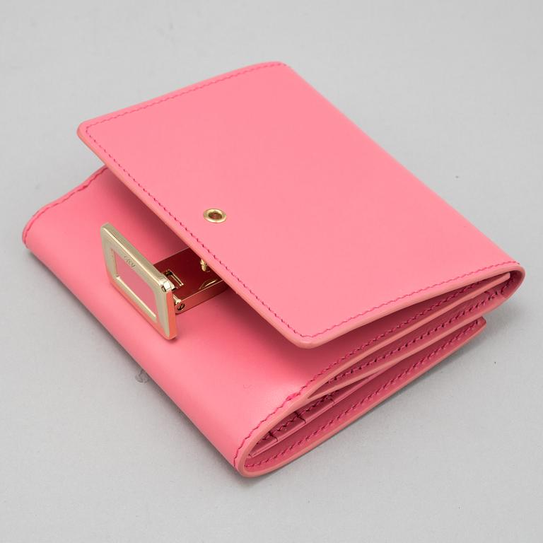 Roger Vivier, a pink leather wallet.