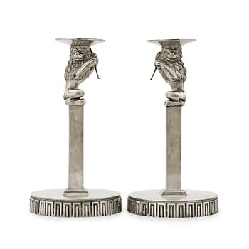432. A pair of Anna Petrus pewter and brass candlesticks, Herman Bergman Konstgjuteri Stockholm ca 1923-25.