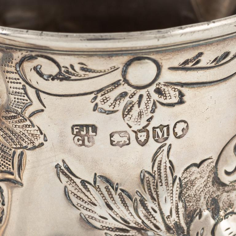 An English silver creamer, London, 1887.