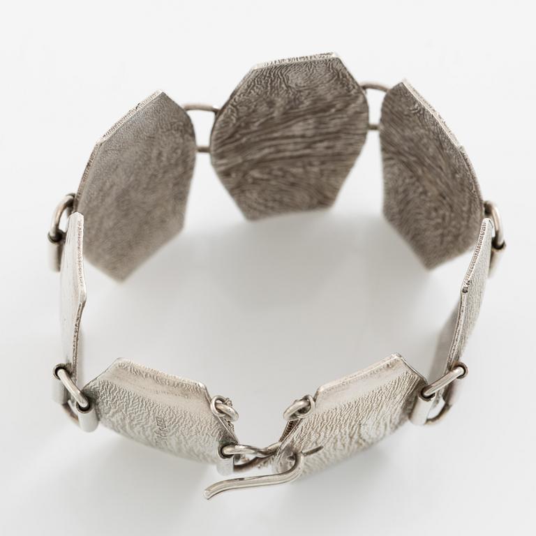 Ring and bracelet, silver, Waldemar Jonsson, blue for Stigbert.