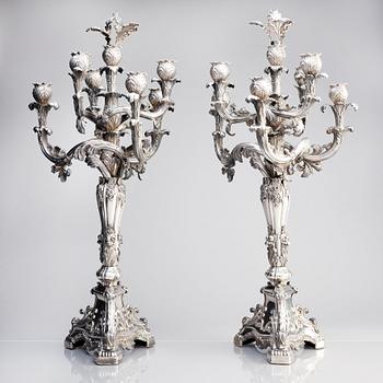 A pair of Swedish mid 19th century silver candelabra, marks of Gustaf Möllenborg, Stockholm 1844.