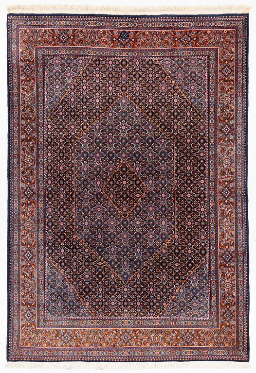 A carpet, oriental, approx. 302 x 210 cm.