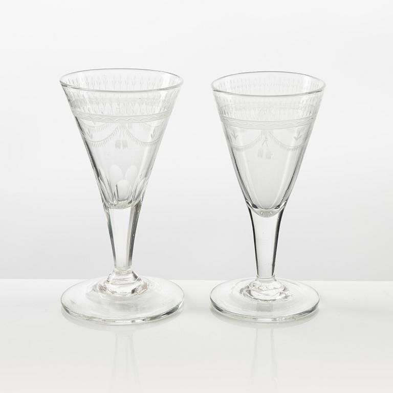 A set of six engraved glasses and one decanter, possibly Strömbäcks or Reijmyre, early 19th Century.