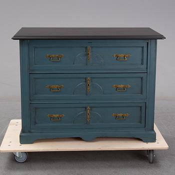 A painted cheast of drawers, circa 1900.