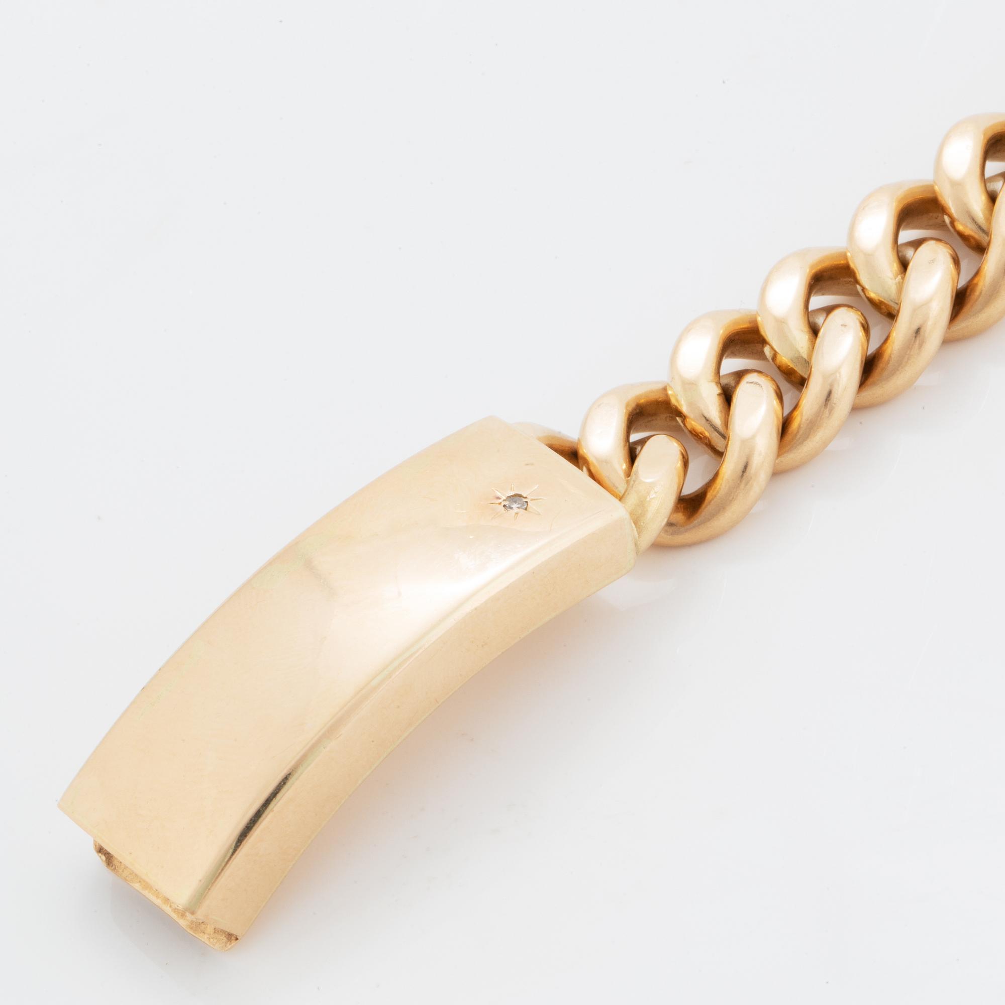 A 14K gold bracelet.