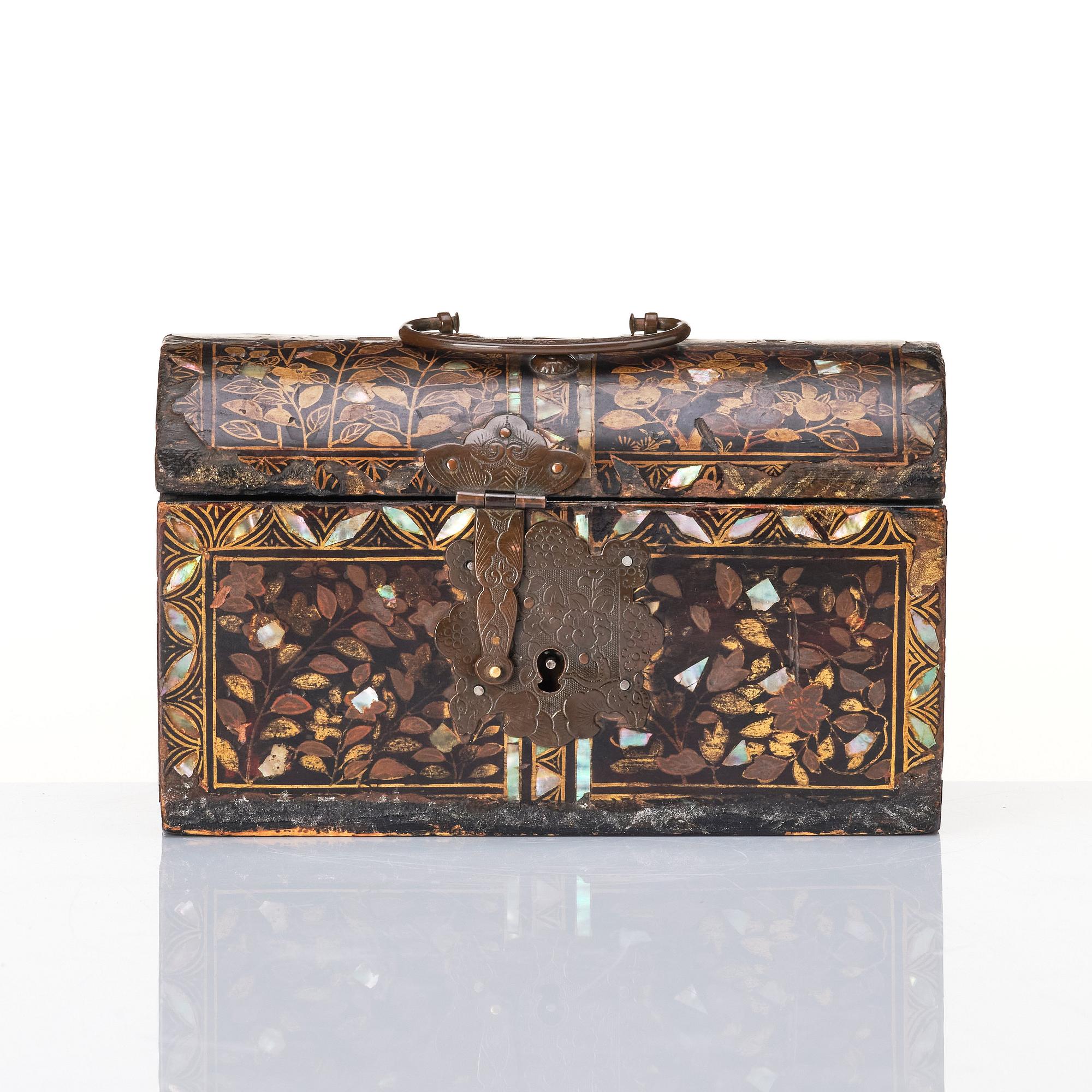 A Japanese lacquer casket/Namban chest, commissioned by the Portuguese, Edo period (1603-1868).