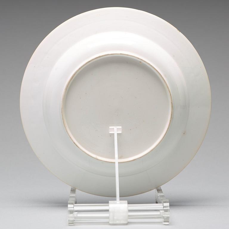 A set of eight blue and white armorial soup dishes, Qing dynasty, 18th Century.