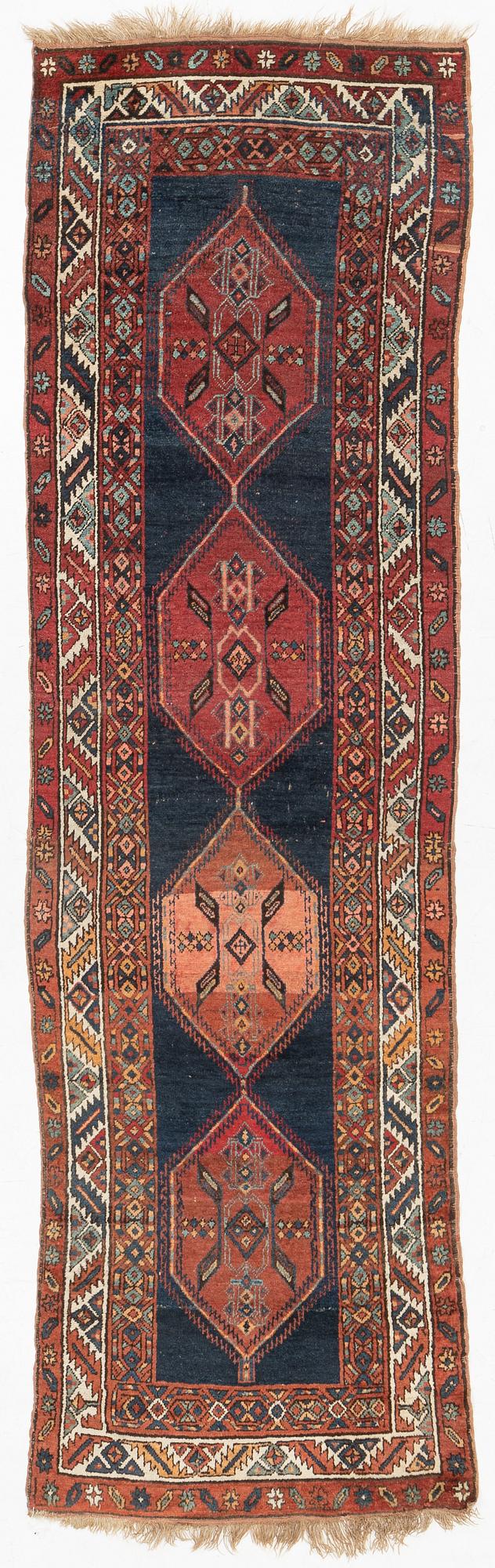 An antique Anatolian/Caucasian runner, c 337 x 99 cm.
