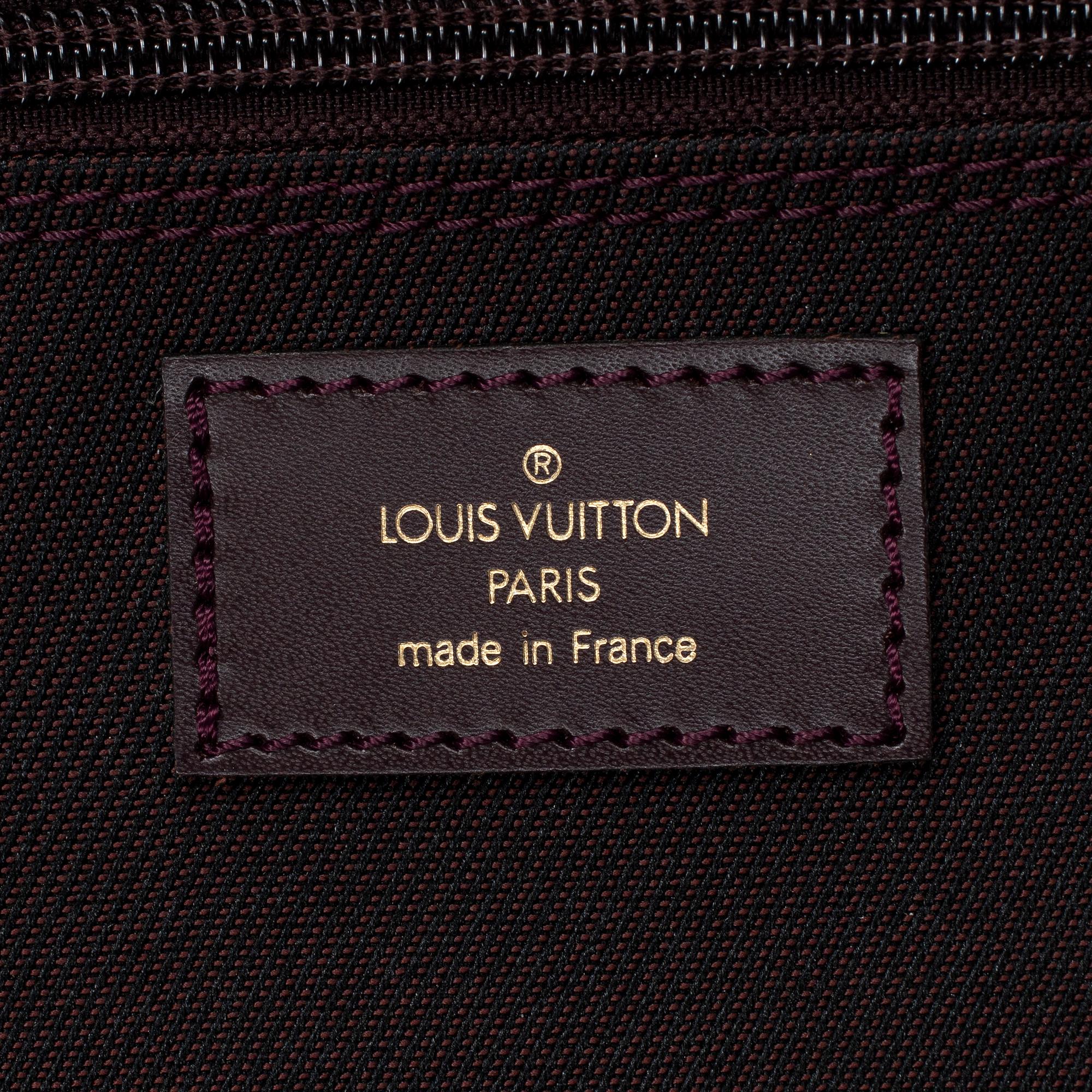 LOUIS VUITTON, a 'Gibeciere' garment cover.