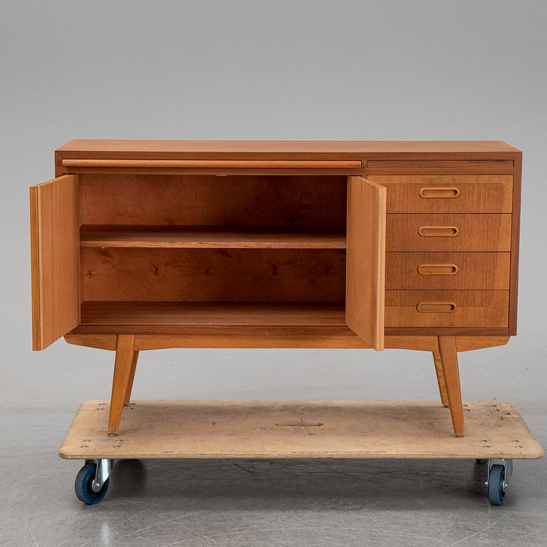 A 1950's teak sideboard.