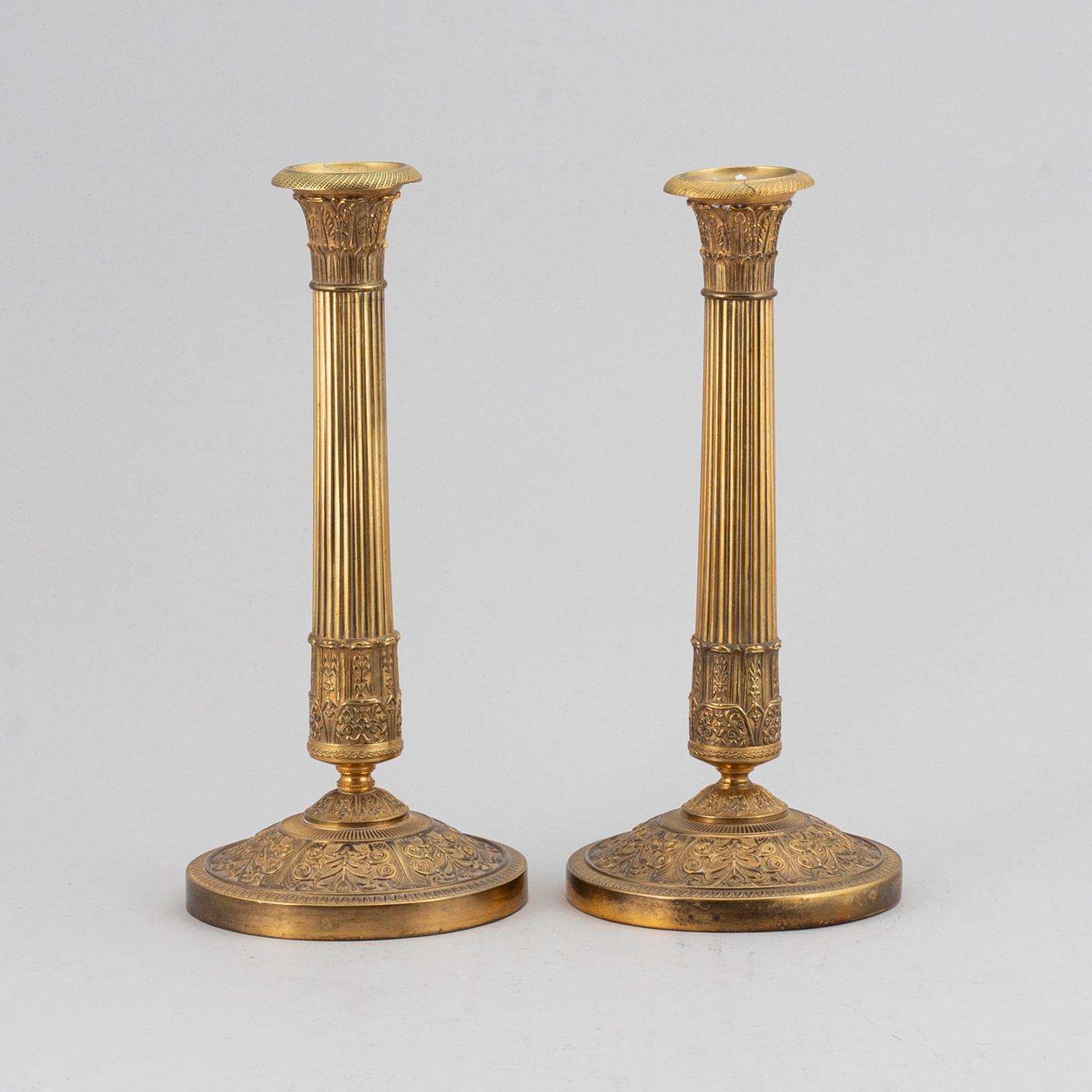 A pair of candlesticks, empire style.