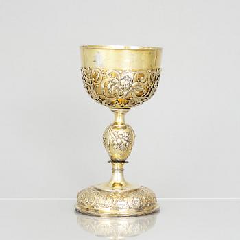 A 17th century silver-gilt cup, marked GM.