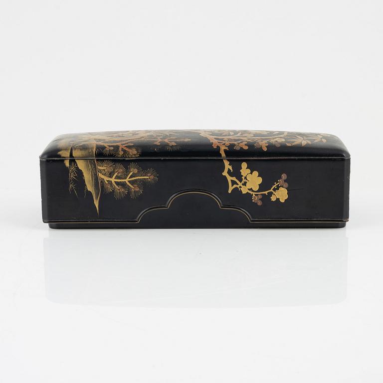 A Japanese lacquer box with cover, circa 1900.