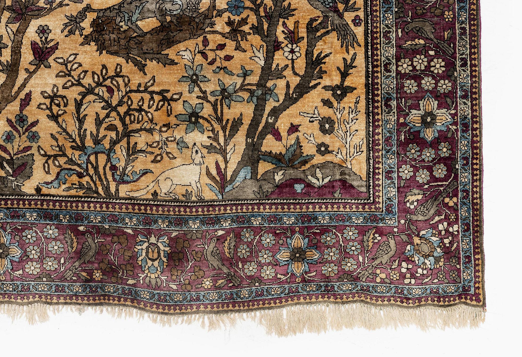 A pictoral silk Kashan 'Mohtasham' rug, c. 195 x 130 cm.