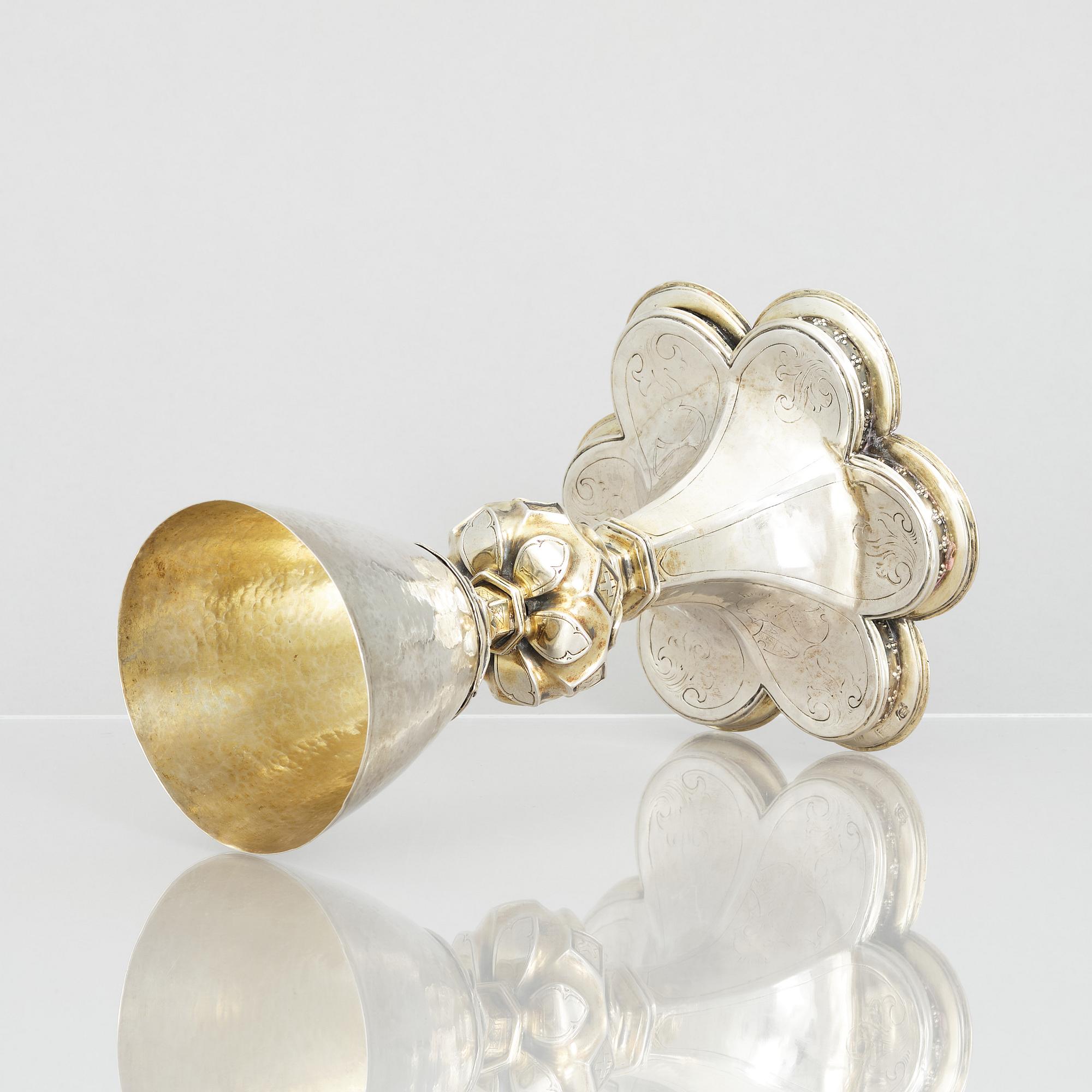 An 18th century parcel-gilt silver cup, unclear marks.