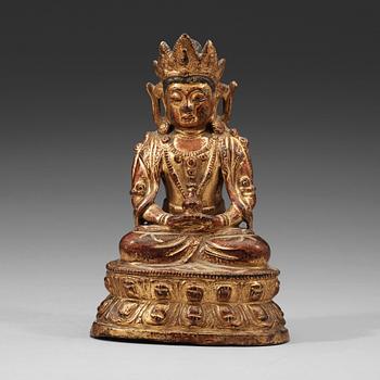 377. A gilt copper alloy sculpture of Guanyin, Ming dynasty (13668-1644).