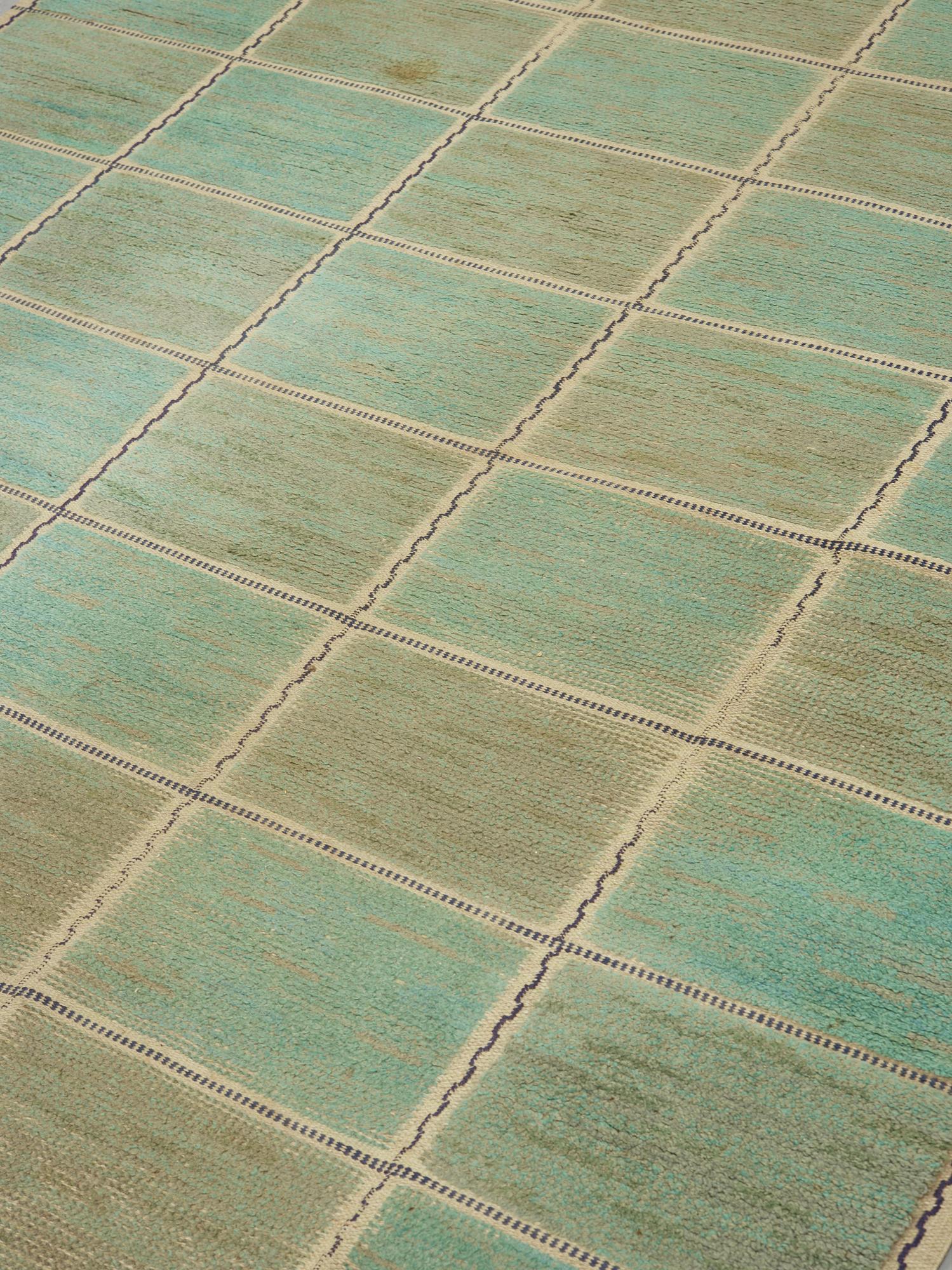 MÄRTA MÅÅS-FJETTERSTRÖM, a carpet, knotted pile in relief, "Rutig grön halvflossa", 311 x 207 cm, signed AB MMF.