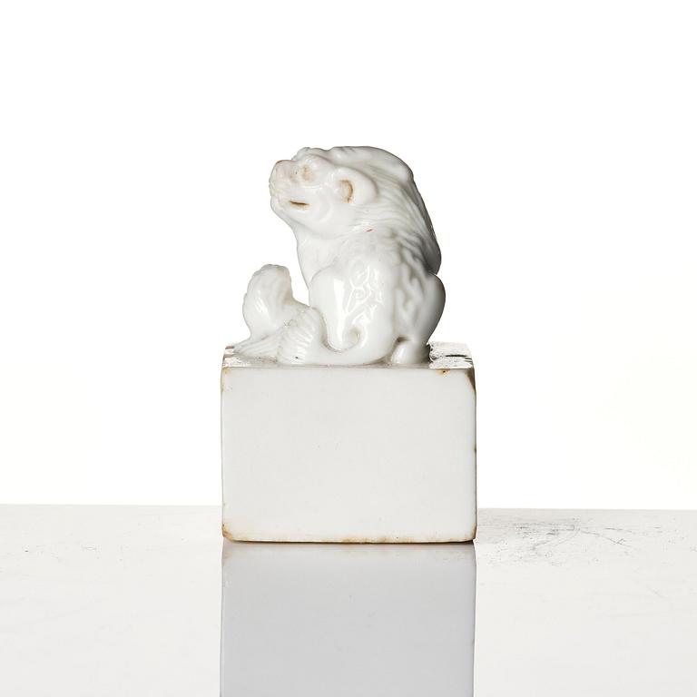 Two seal stamps, soapstone and blanc de chine. Qing dynasty 18th/19th century.