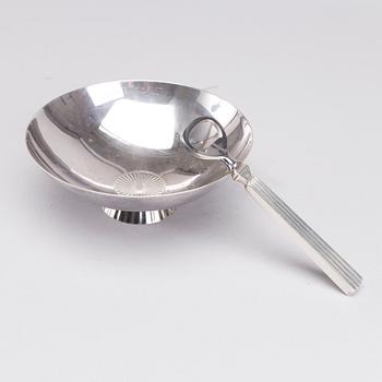 A Danish 20th century set of sterling silver bowl and opener, mark of S Bernadotte and G Jensen, weight ca 315 gr.
