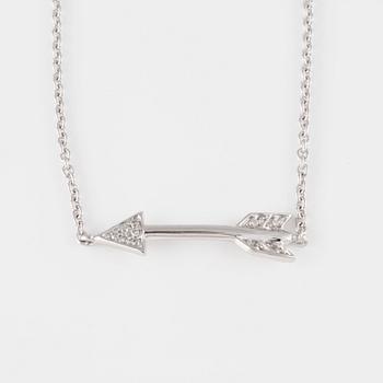 ARMBAND, 18K vitguld med briljantslipade diamanter ca 0.03 ct. Vikt 1,4 gram.