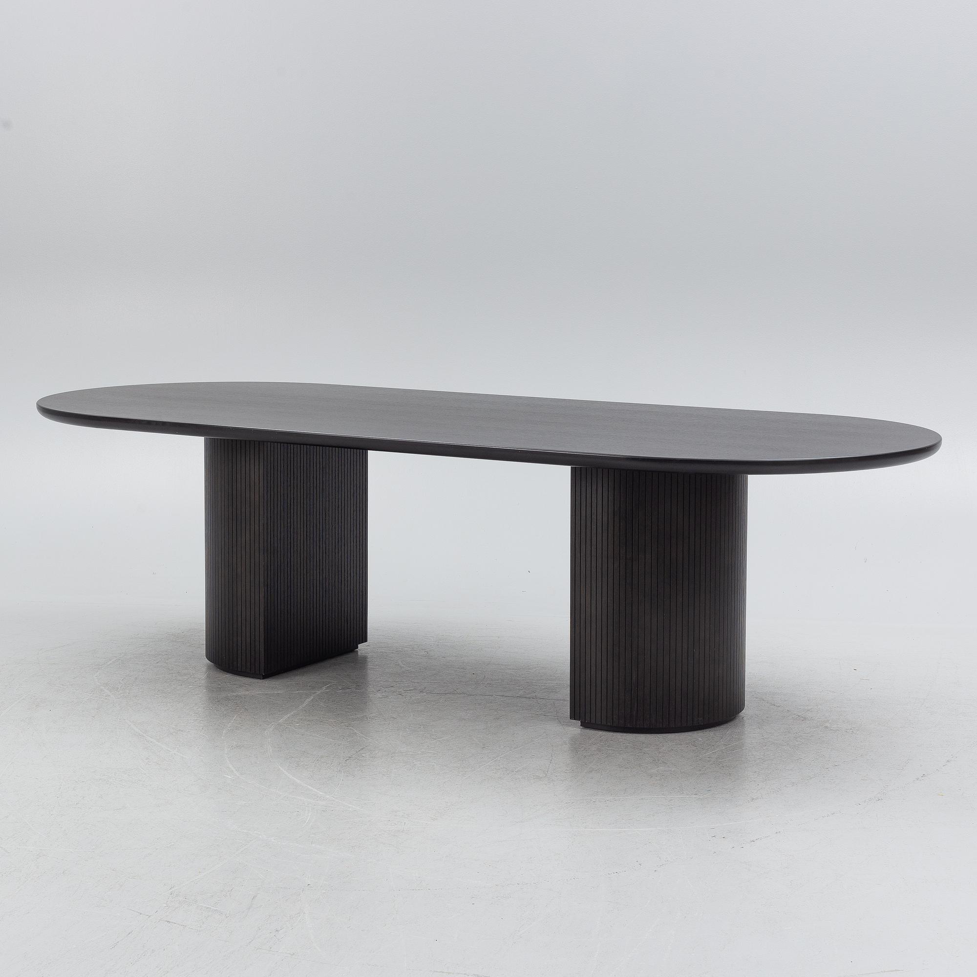 Space Copenhagen, a 'Moon' dining table, Gubi, Denmark.