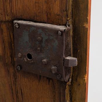 A 18th century corner cabinet.