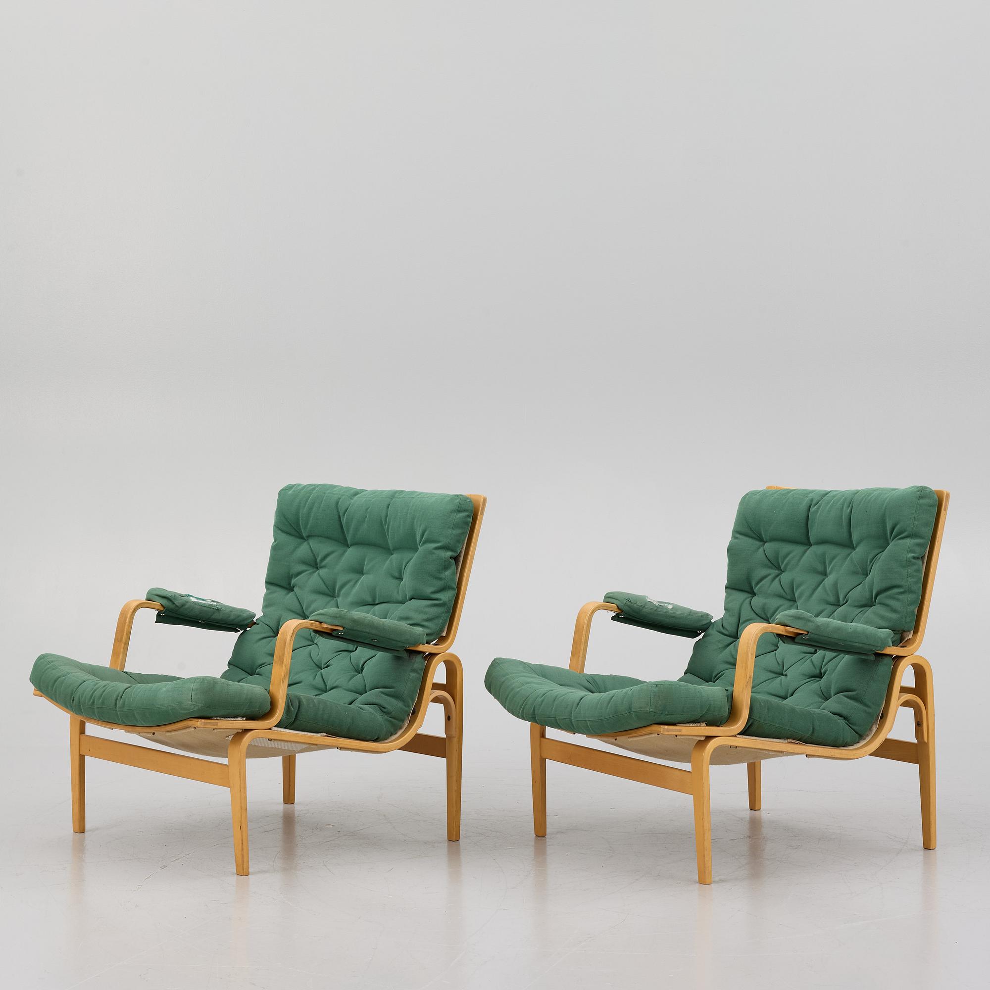 Bruno Mathsson, a pair of "Ingrid" armchairs, Dux, Sweden, second half of the 20th century.