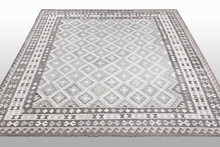 A carpet, Kilim, ca 297 x 257 cm.