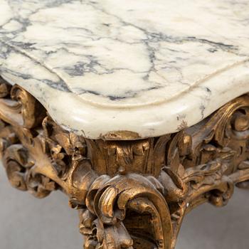 A second half of the 20th Century bronzed table with a marble top.