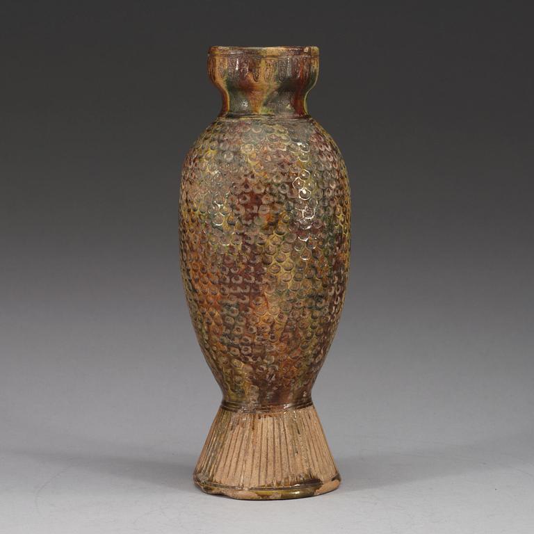 A potted fish shaped vase, presumably Tang dynasty.