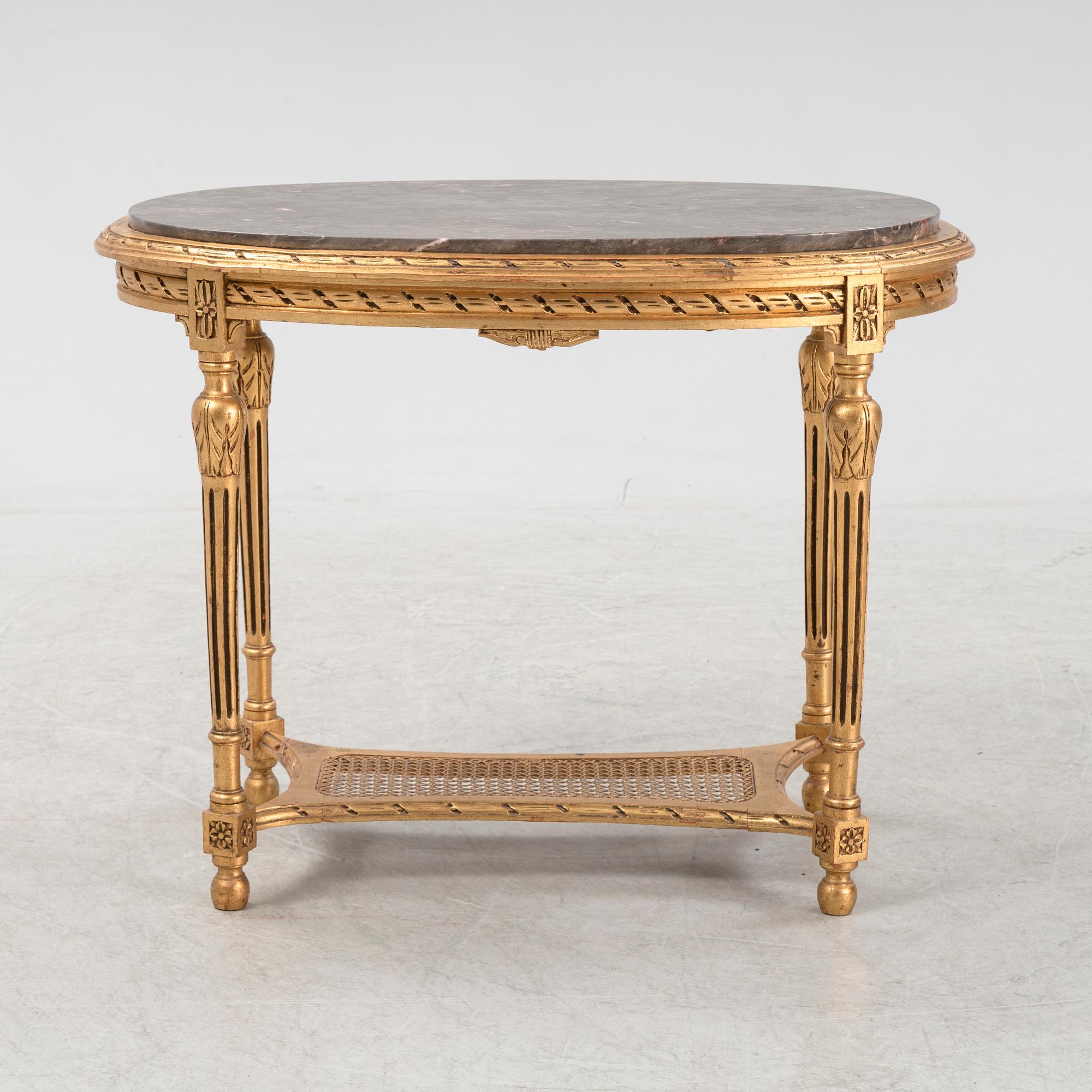 A Louis XVI style table, 20th Century.