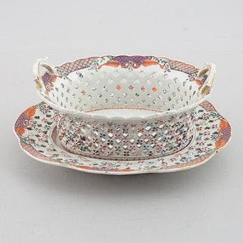 A famille rose chesnut basket with stand, Qing dynasty, 18th century.
