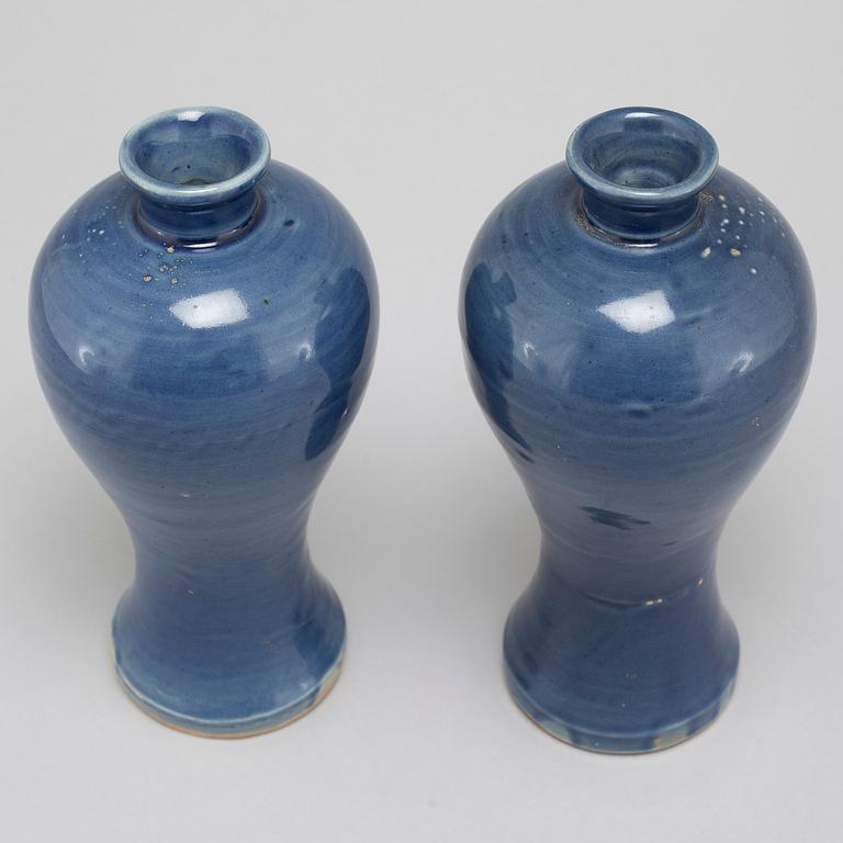 A pair of blue glazed meiping vases, 17th Century.