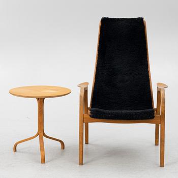 Yngve Ekström, a 'Lamino' armchair and sidetable, Swedese, Sweden, early 21st century.