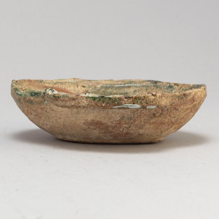 A pottery wine goblet and a vase, the green glazed goblet Han dynasty (206 BC-220 AD).